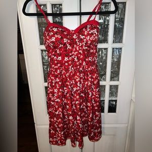 Red floral mid length dress size small fits like a XS